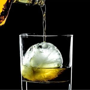 TWO ROUND ICE CUBE MOLDS-USED ONCE